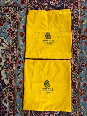 Two Goyard dust bags